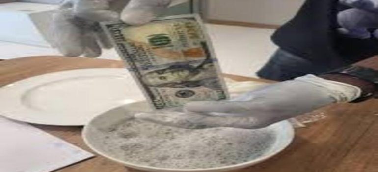 Activation powder and SSD chemical used for cleaning stained notes