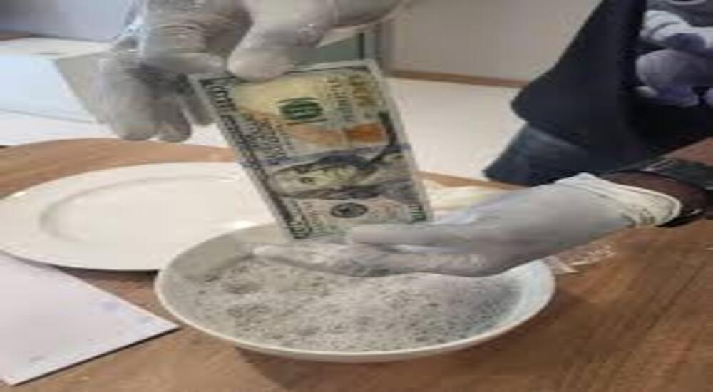 Activation powder and SSD chemical used for cleaning stained notes
